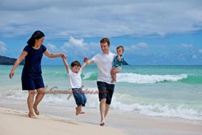 Waimanalo Beach Family portrait walking on the beach holding hands
