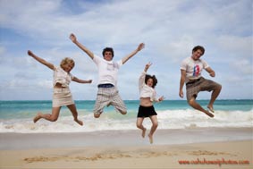 Family Fun Portrait Beach Jump Shot Waimanalo Beach Oahu Hawaii