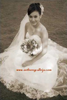 Portrait of Bride sitting on the grass Koolina Wedding Photography