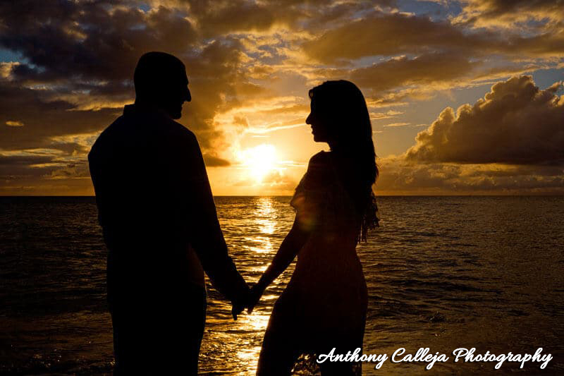 Portrait of a Silhouette of an Engagement Couples at Papailoa Beach, North Shore, Oahu