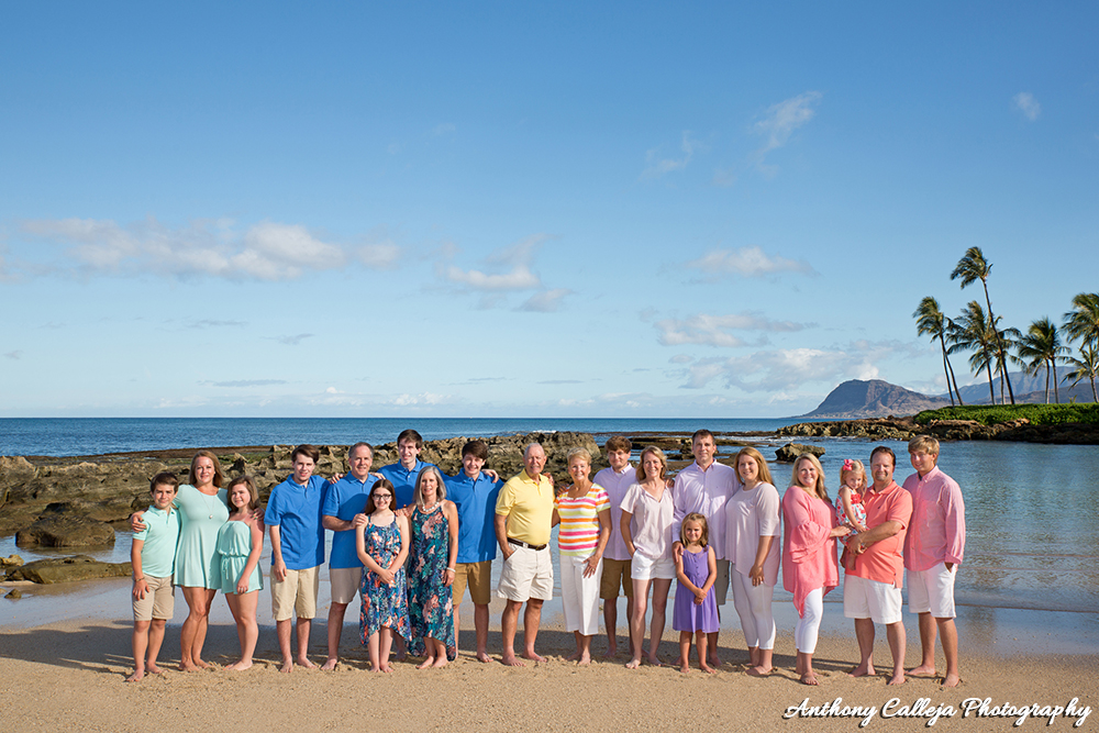 Clothing Ideas - Beach Portrait - family of twenty wearing pastel-colored clothing for a photo session at Paradise Cove Beach, Oahu, Hawaii