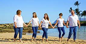 Mini Photo Session - Paradise Cove Family holding hands walking on the beach