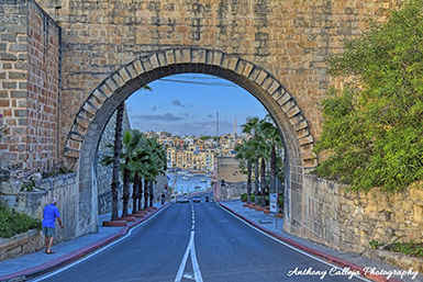 Birgu (Maltese: Il-Birgu [ɪlˈbɪrɡʊ], Italian: Vittoriosa), also known by its title Città Vittoriosa ('Victorious City'), is an old fortified city on the south side of the Grand Harbour in the Port Region of Malta. The city occupies a promontory of land with Fort Saint Angelo at its head and the city of Cospicua at its base. Birgu is ideally situated for safe anchorage, and over time it has developed a very long history with maritime, mercantile and military activities.