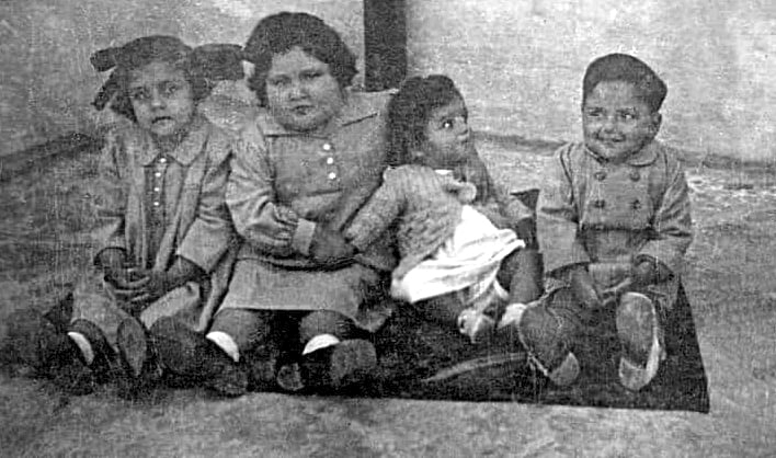 Calleja children family photo. From Left to right. Sister Tessie, Sister Carmen, Sister Nancy, and Brother Victor. Circa 1952