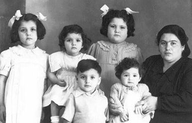 Family portrait circa 1952. From left to right. Tessie, Nancy, Victor, Carmen, Mary and our mother Theresa.