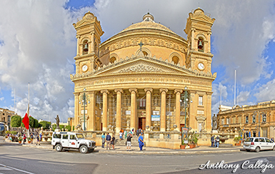 Rotunda of Mosta: The Sanctuary Basilica of the Assumption of Our Lady (Maltese: Santwarju Bażilika ta' Santa Marija), commonly known as the Rotunda of Mosta (Maltese: Ir-Rotunda tal-Mosta) or the Mosta Dome, is a Roman Catholic parish church and basilica in Mosta, Malta, dedicated to the Assumption of Mary. It was built between 1833 and the 1860s to neoclassical designs of Giorgio Grognet de Vassé, on the site of an earlier Renaissance church which had been built around 1614 to designs of Tommaso Dingli.