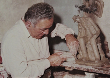 Photo of my mother's brother Carmenu Caruana working on one of his art pieces.